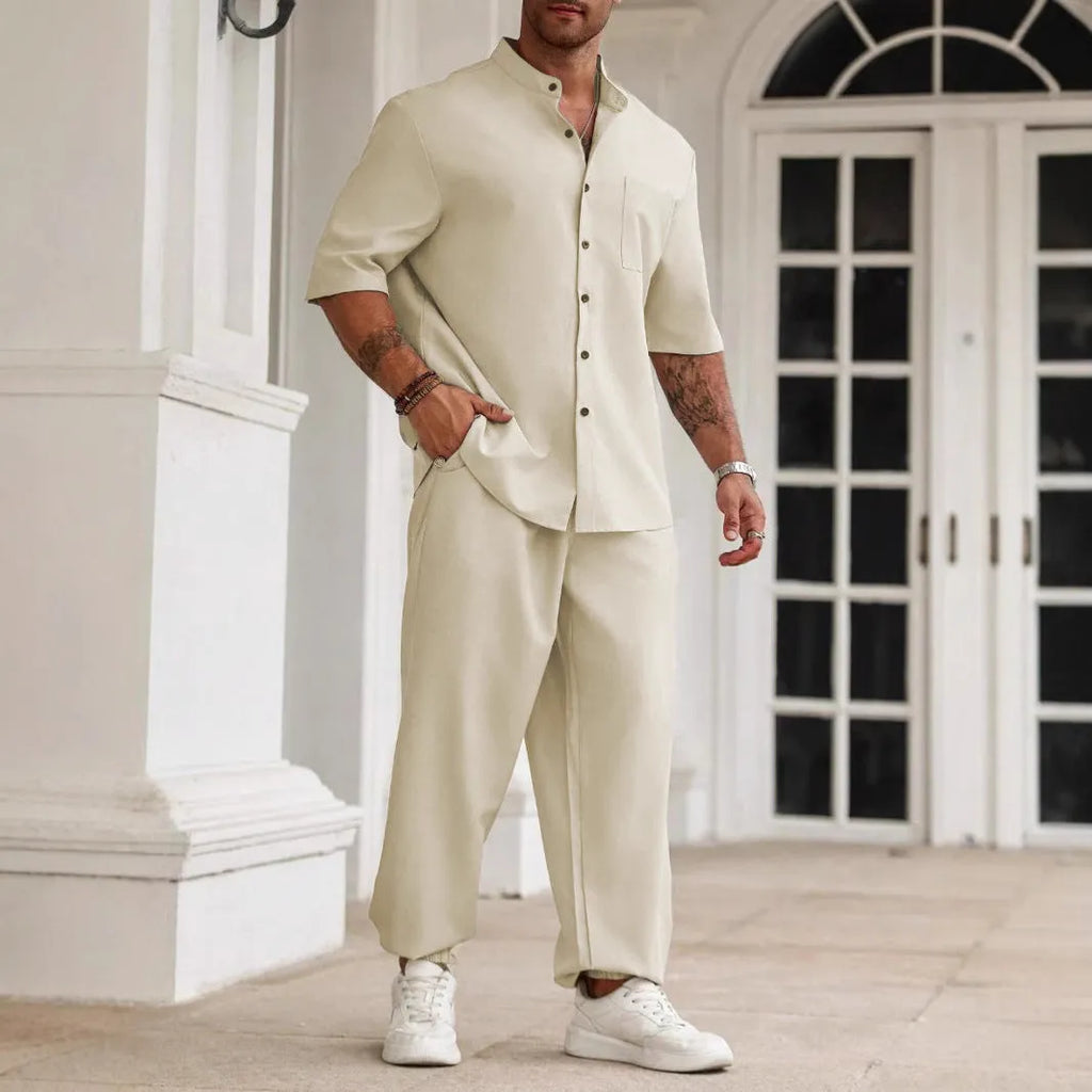 Men's apricot cotton linen casual short sleeve shirt and long trousers set laid flat.