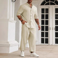 Men's apricot cotton linen casual short sleeve shirt and long trousers set laid flat.