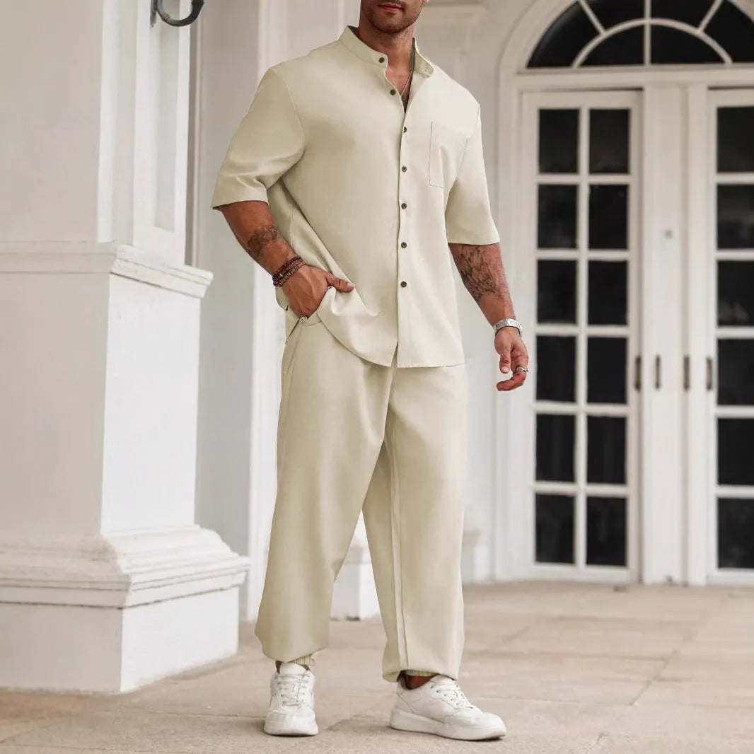 Men's apricot cotton linen casual short sleeve shirt and long trousers set laid flat.
