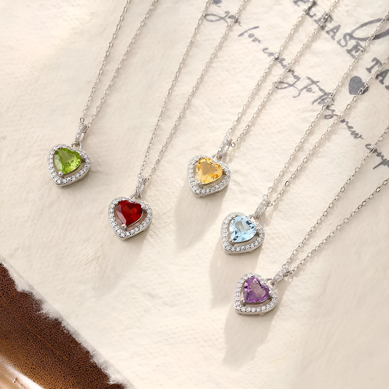 Heart shaped amethyst pendant on a 925 sterling silver cross chain necklace for women