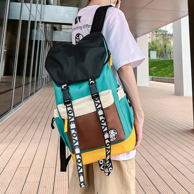 Oxford cloth backpack in black, green, or red with handheld and shoulder straps