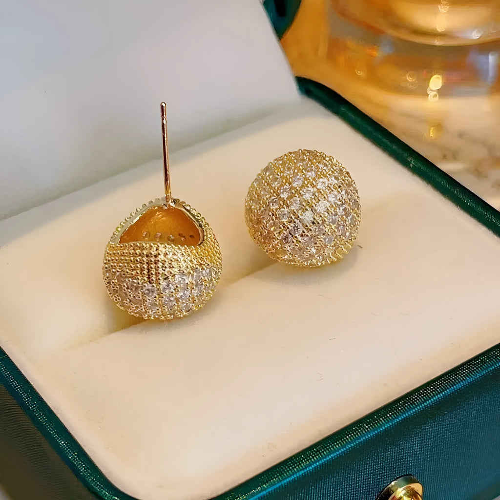 Women's geometric drop-shaped gold earrings with full diamond little golden beans design and spherical elements