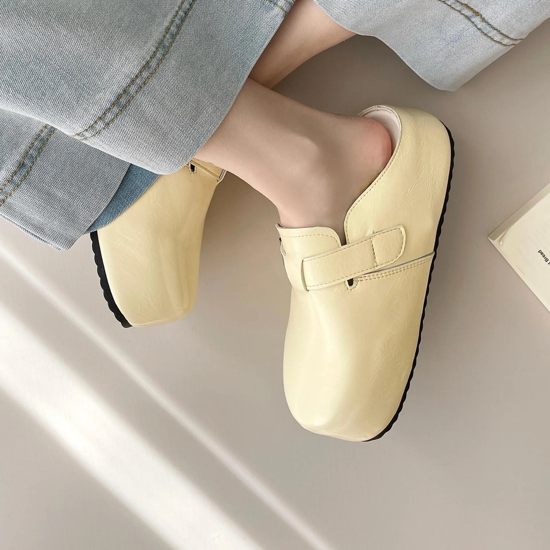 Flat buckle casual sneakers in creamy-white with round toe and PU upper