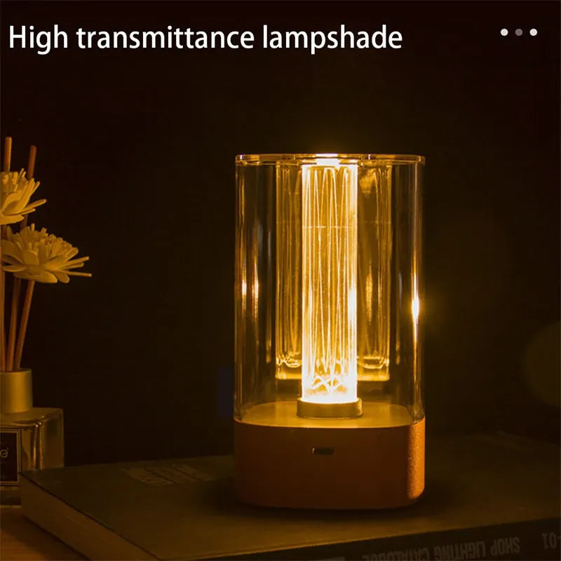 Rose gold LED touch atmosphere light with Auspicious Cloud pattern on a bedside table, USB charging cable included