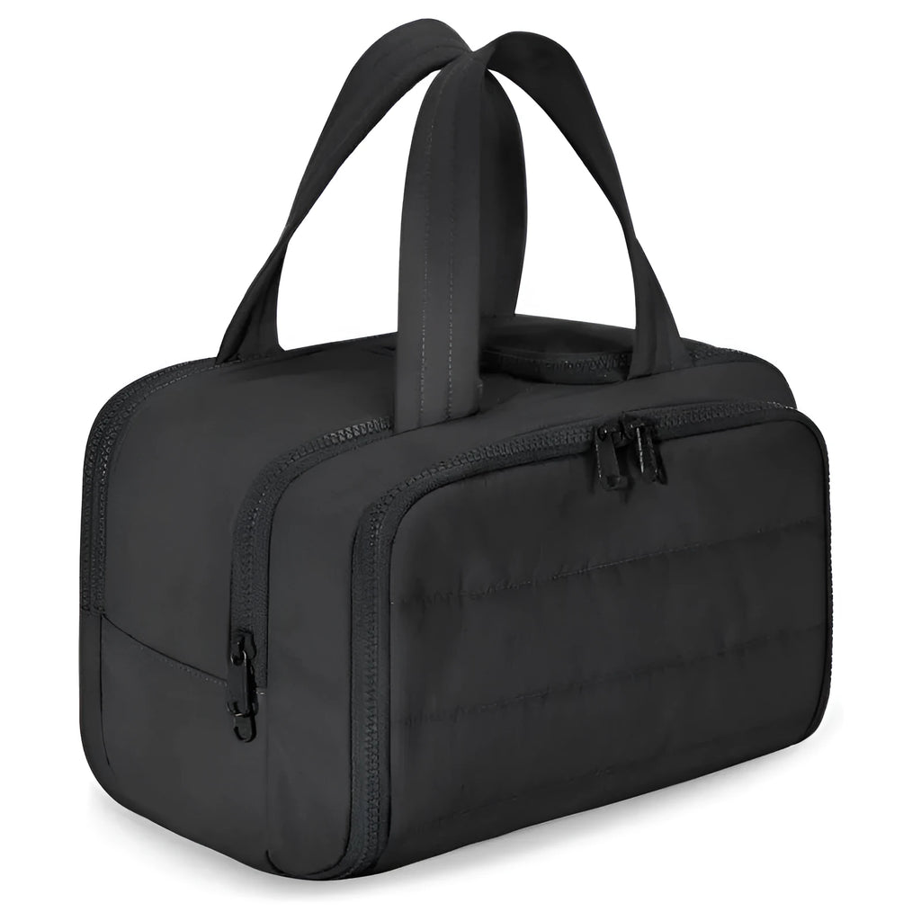 Large lightweight travel toiletry bag in beige colour with wide open top showing spacious interior.