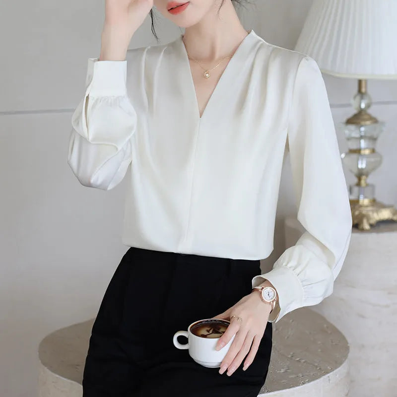 Women's long sleeve solid blue satin shirt with slim fit and 3D stitching, front view