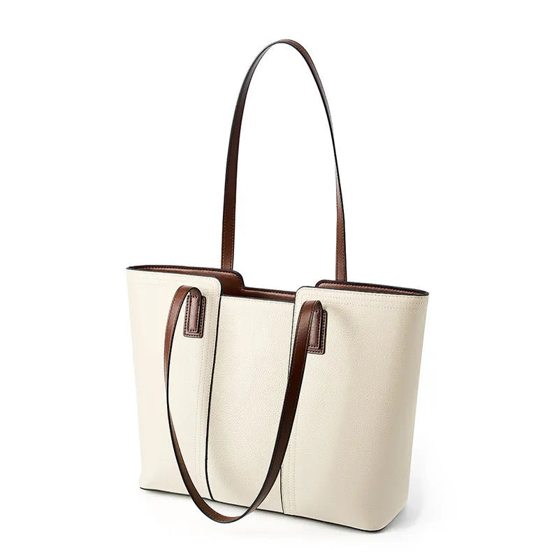 Genuine leather women's crossbody commuter bag in black with internal organisation compartments