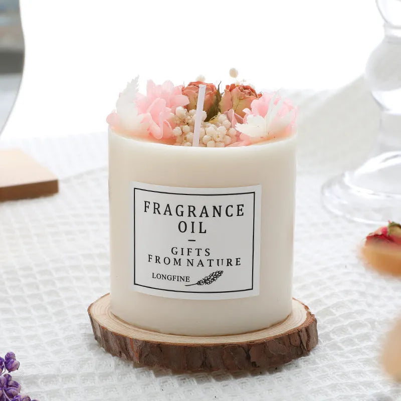 Aromatherapy candle with dried flowers on top, shown in various scent style options.