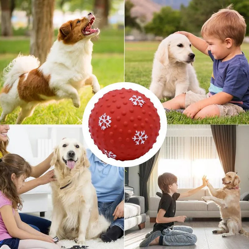 Red dog toy ball with snowflake print pattern, 7cm diameter, bouncing on grass
