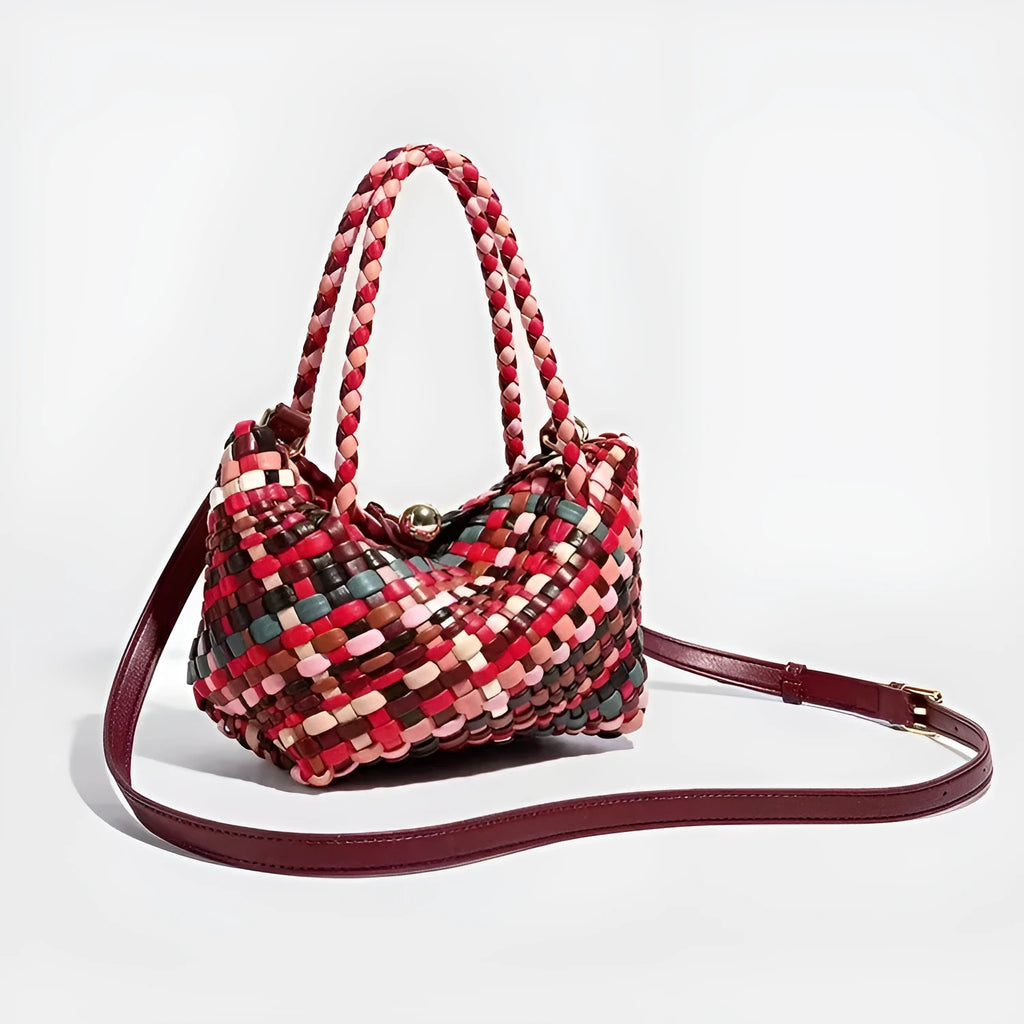 Women's casual handmade woven PU shoulder bag in colour, 18x11x14cm, on display