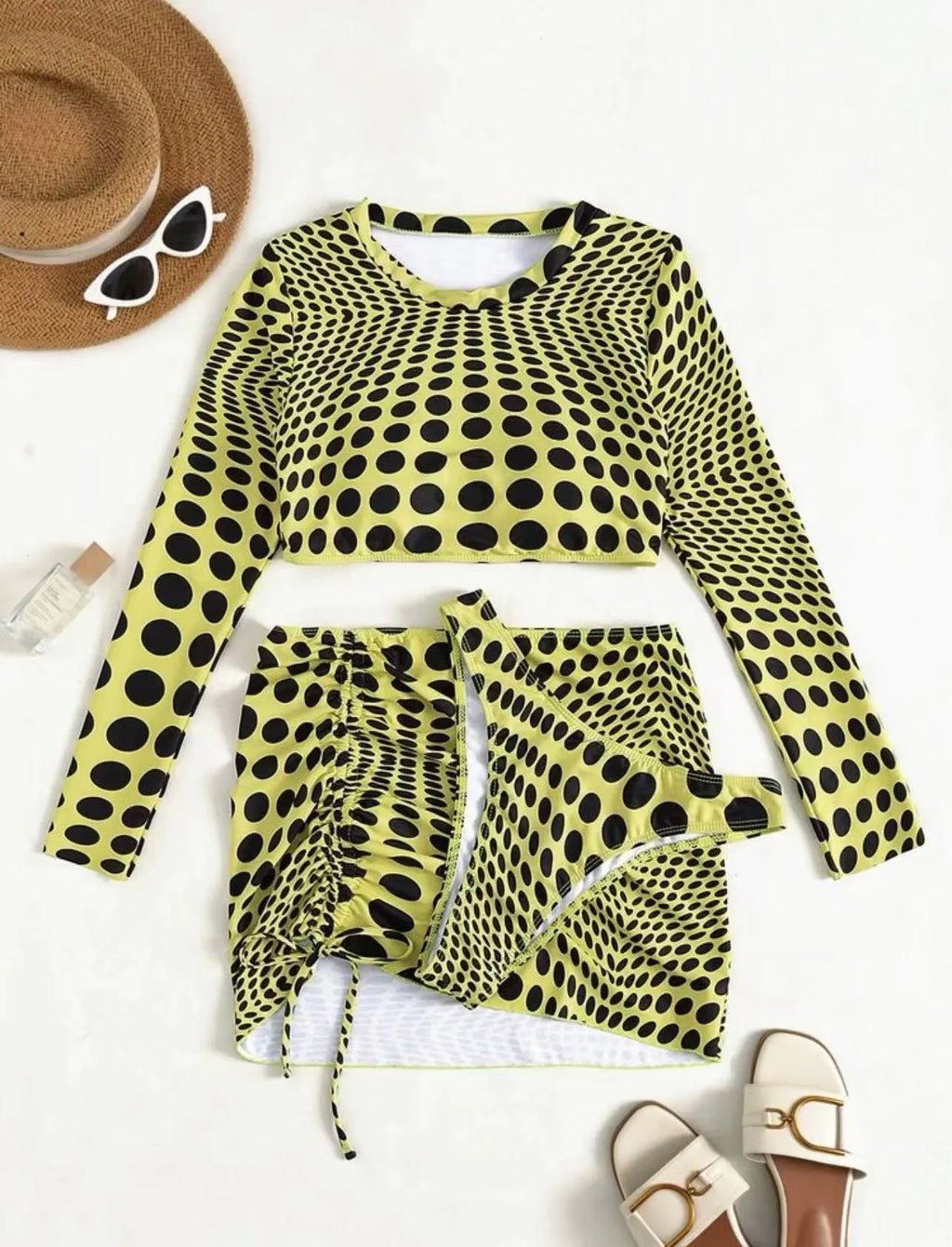 Women's polka dot swimsuit three-piece set in green, including top, skirt, and bra, made of polyester.
