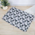 Reusable washable pet urine pad in animal world pattern showing waterproof cloth material.