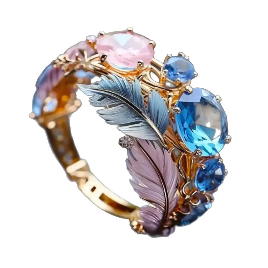 Gold brass zircon feather ring with embossed colourful pattern and geometric shape