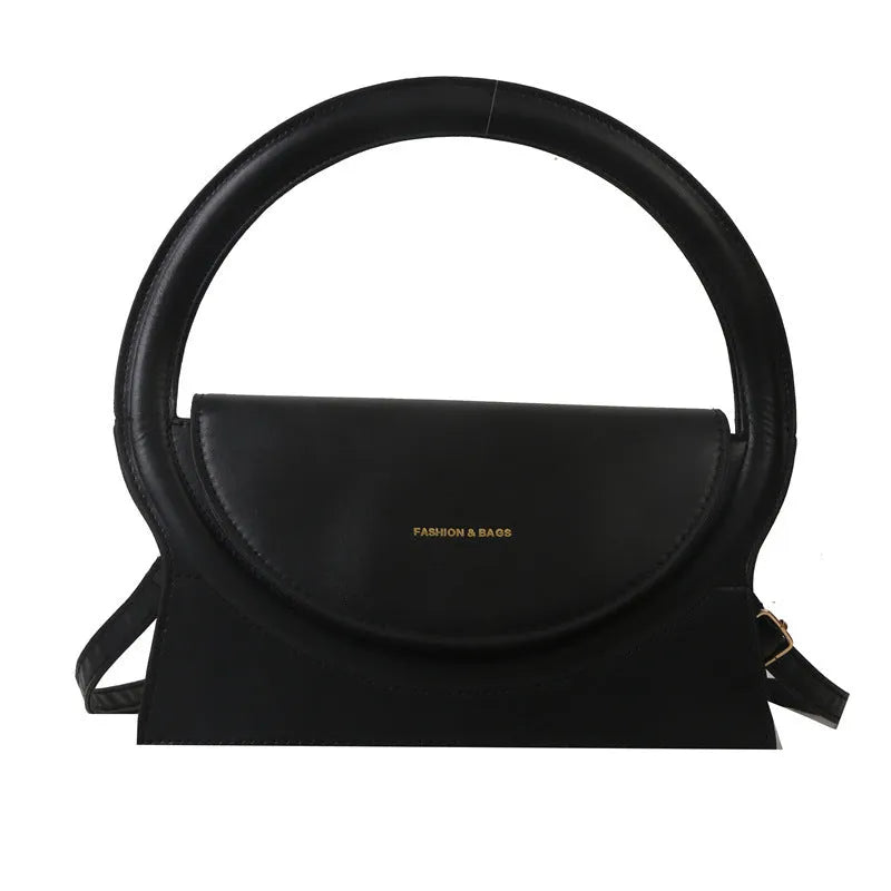 PU leather messenger bag in horizontal square shape with phone compartment and stitching detail