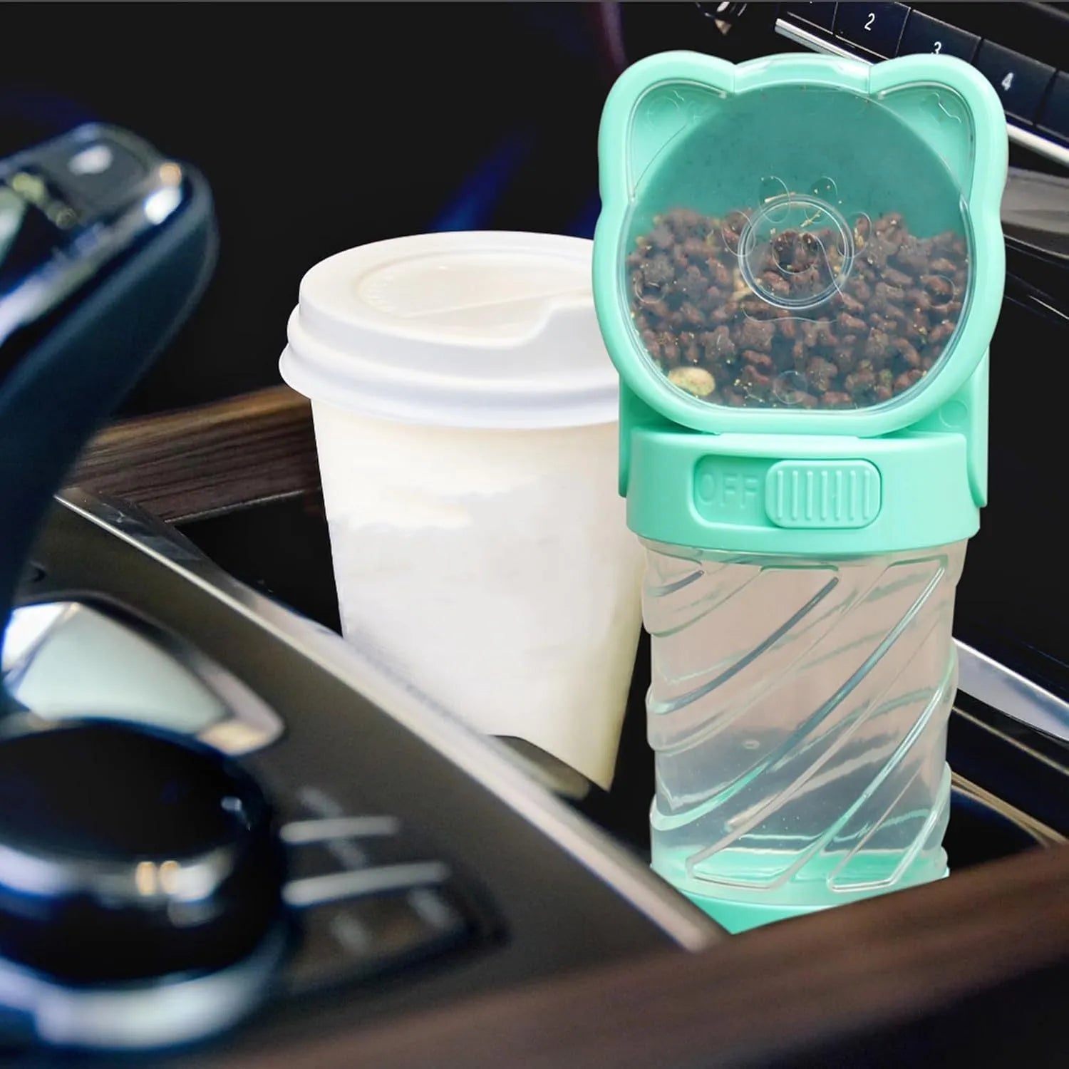 Green 3-in-1 portable pet water bottle with food container and strap, showing rotary switch and bowl.