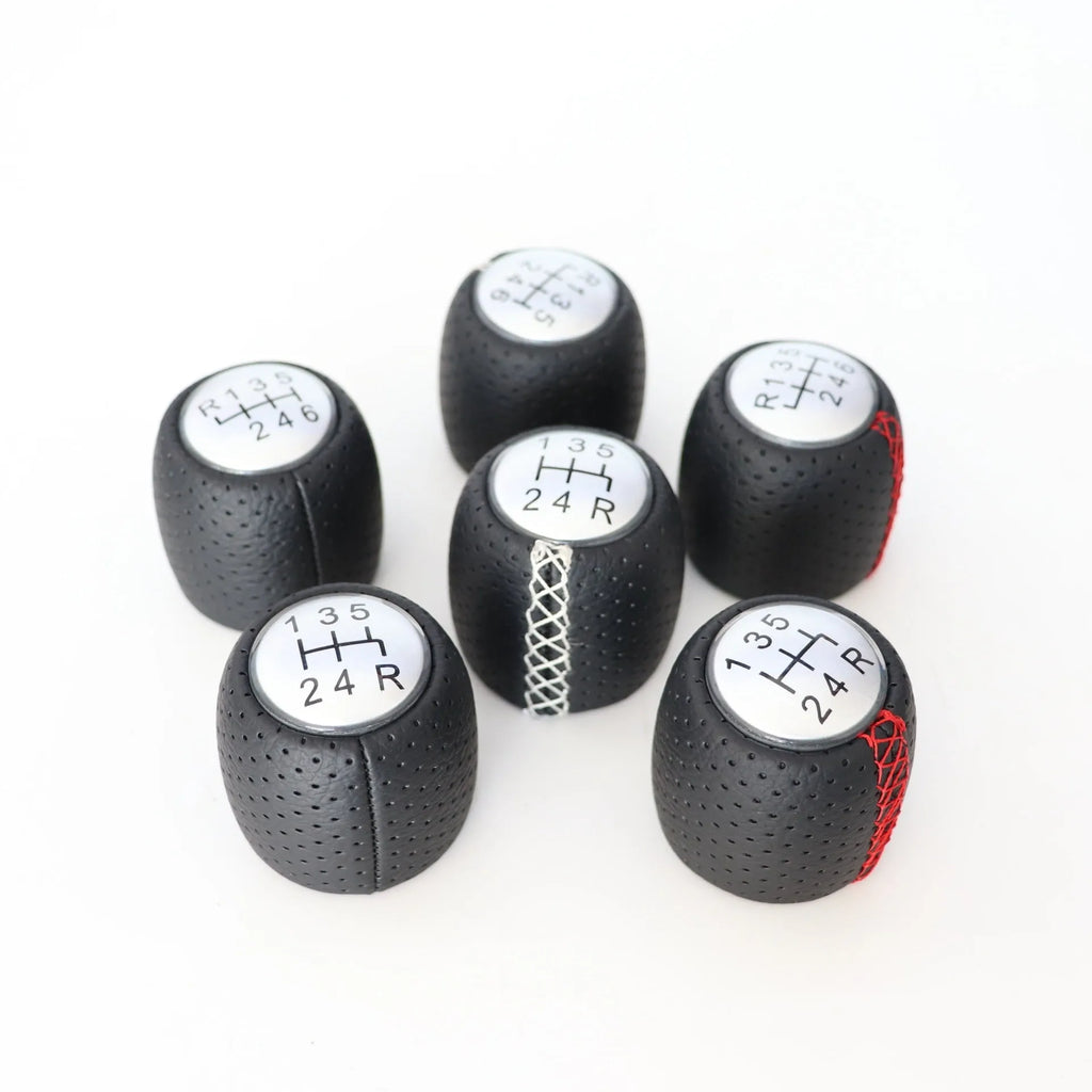 Sewn wrapped perforated PU gear shift knob handball for Alpha vehicle in black line with matte cover