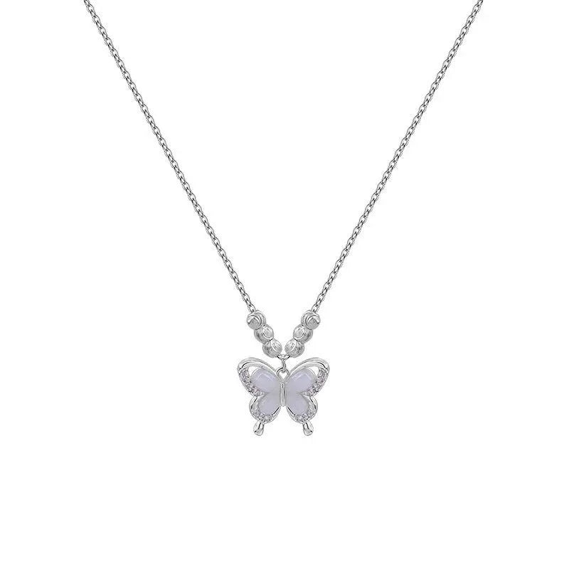 Close-up of a women's sterling silver necklace with a square-framed butterfly pendant on an adjustable chain.