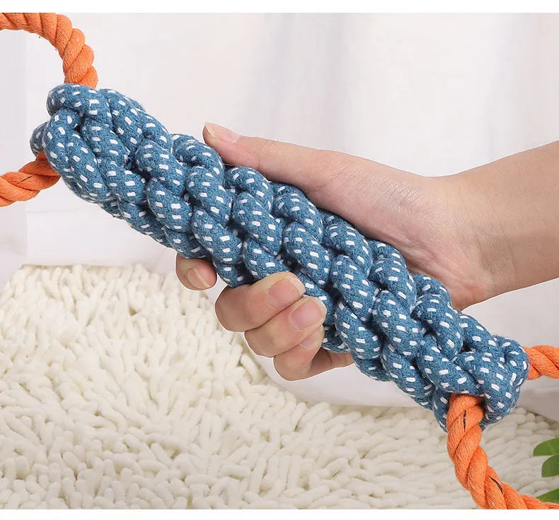 Blue braided cotton double-ring dog teething toy on white background