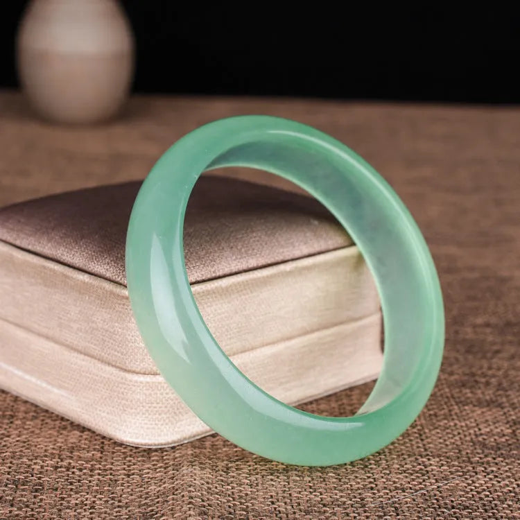 Oil cyan light green quartz rock jade bracelet with smooth polished finish, modern simplicity style