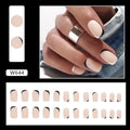 Black and white frosted French style false nails with mandarin duck colour contrast on plastic wearable armour.