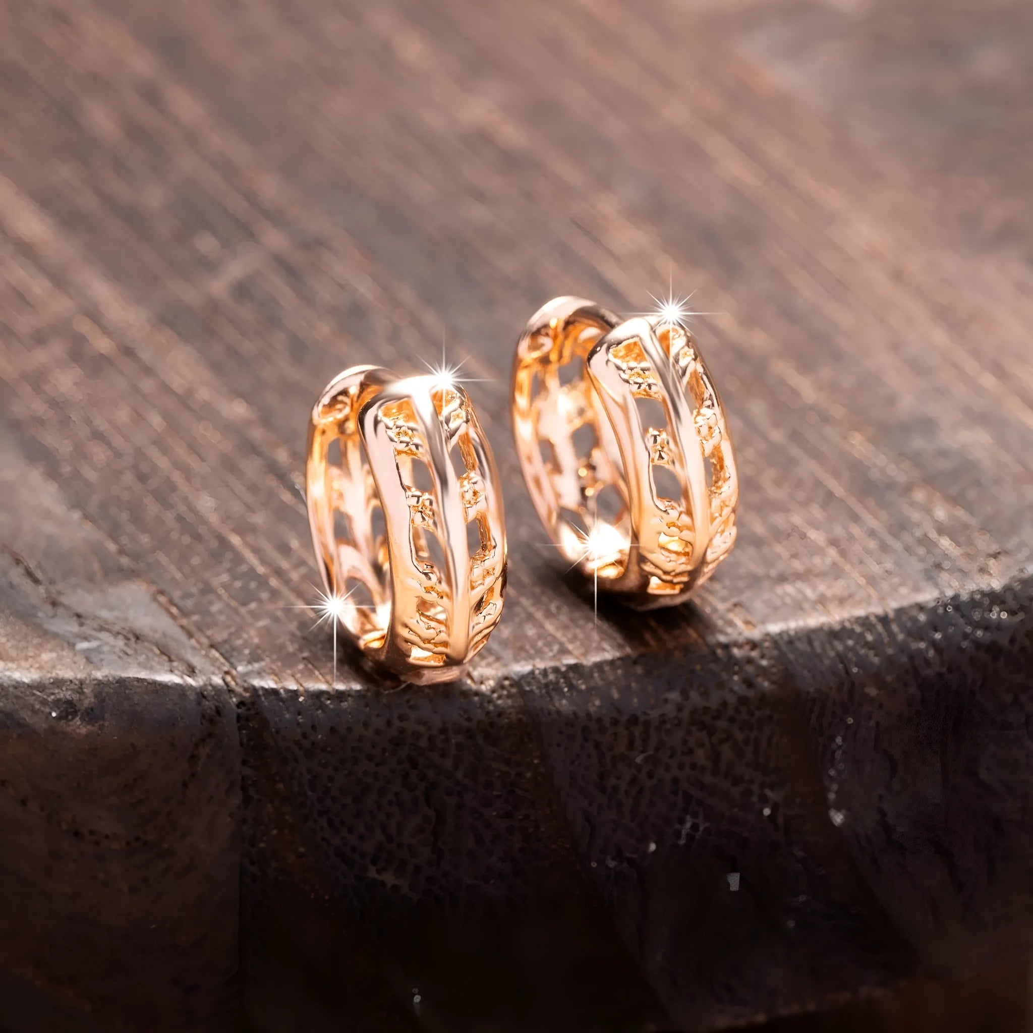 Rose gold plated copper leaf earrings with hollowed out design and heart-shaped detail