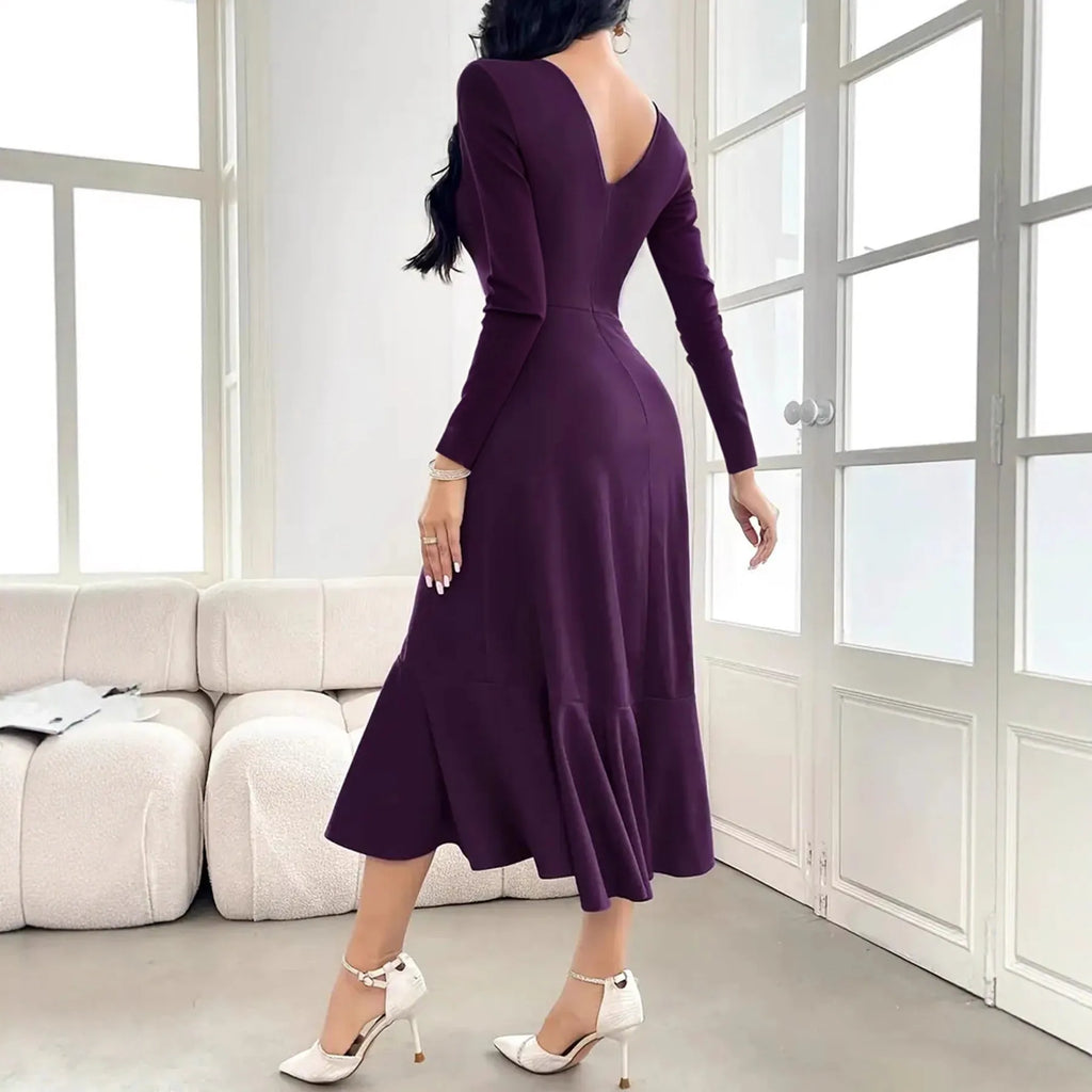 Purple women's long sleeve round neck pullover dress with ruffle detail on a mid-waist.