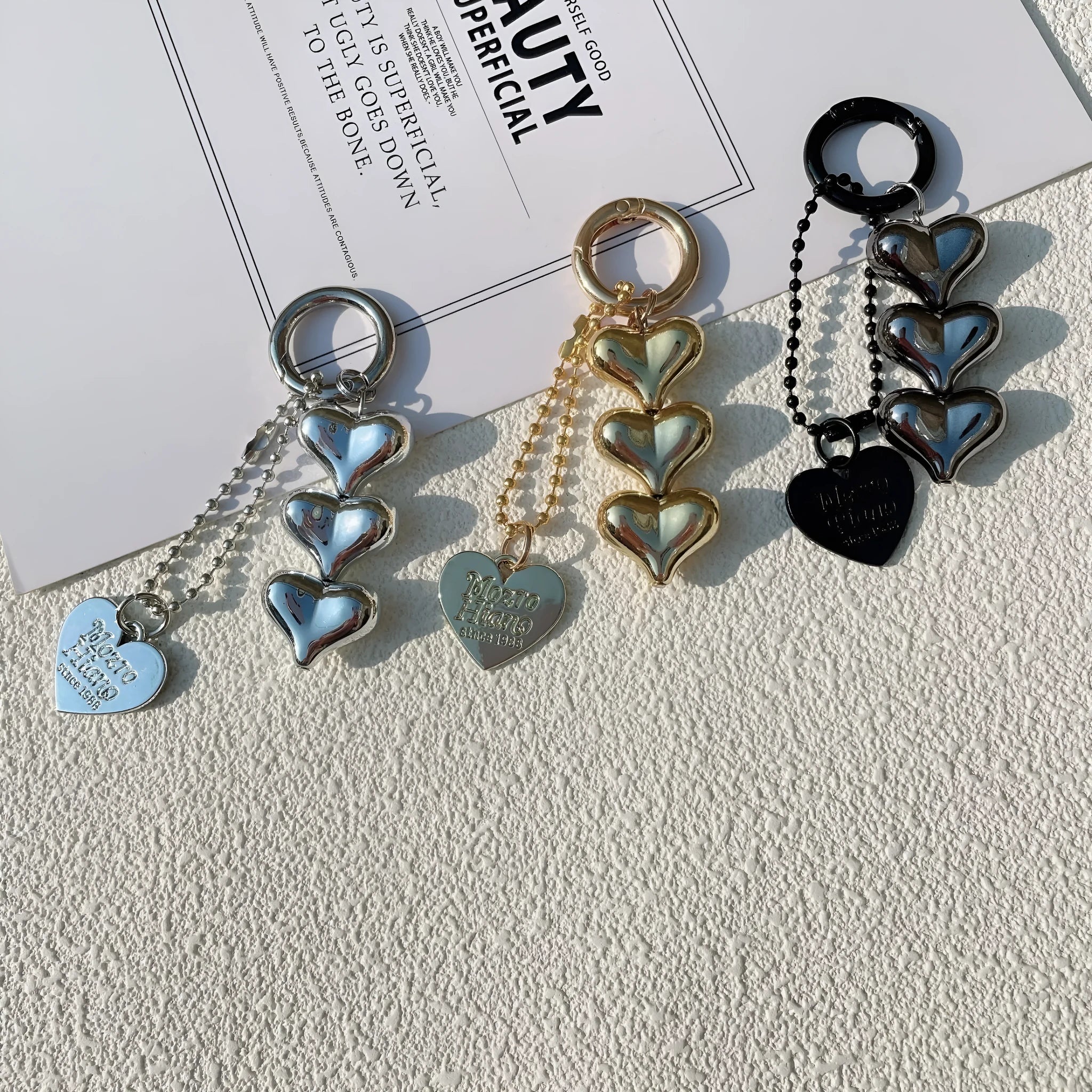 Acrylic Love Heart key ring with electroplated finish in metallic gold colour on a keychain