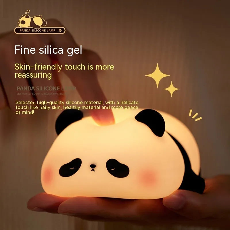 Panda shaped night light with silicone construction showing clap activation feature and USB charging port