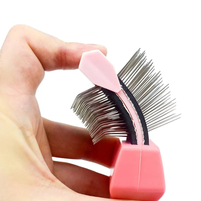 Blue double-sided pet brush with stainless steel pins and soft pins on a non-slip ergonomic handle.