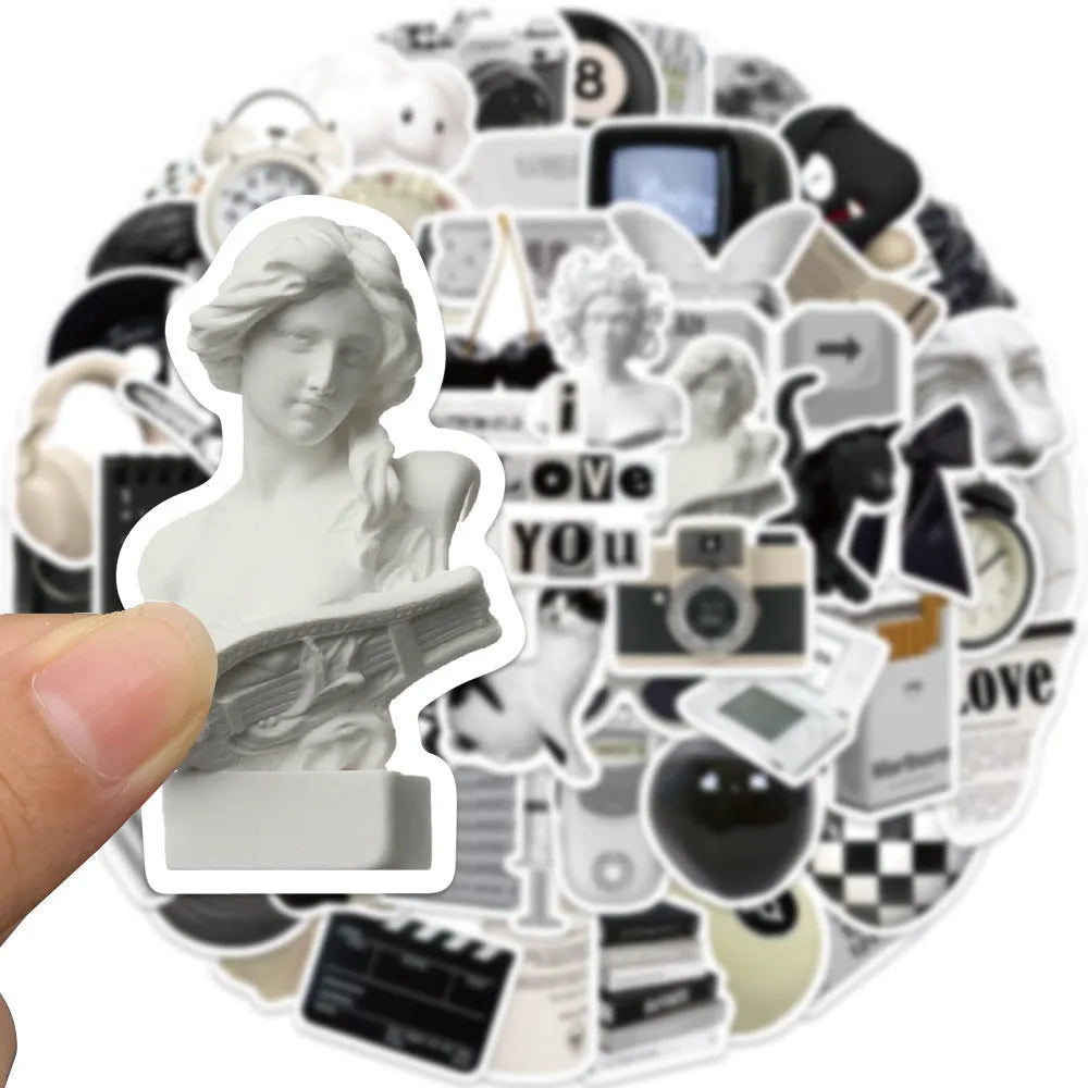 61 black and white PVC waterproof stickers on a sheet for laptops, phones and luggage