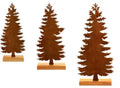 Three rusty metal Christmas decorations with elk and tree designs on white background