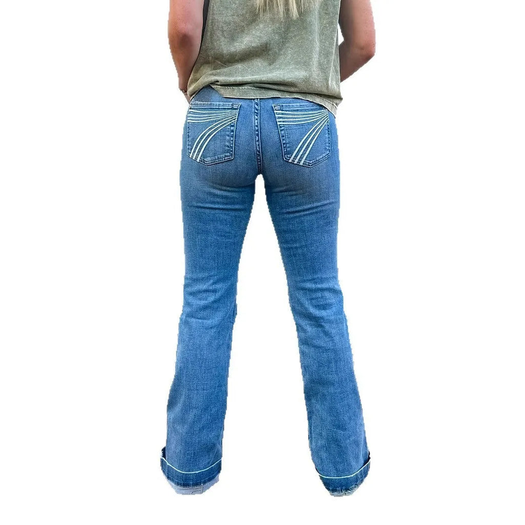Slim fit elastic mid-waist jeans with slight flare and embroidery detailing in denim fabric