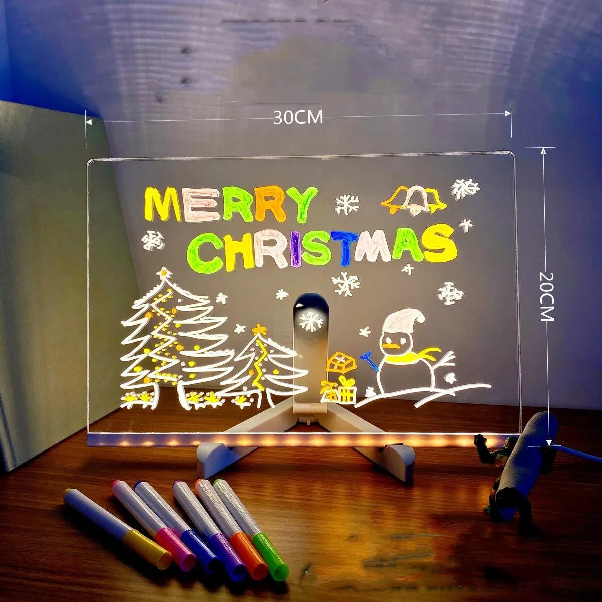 Acrylic DIY note board LED night light with pens on desk, showing written message and soft glow