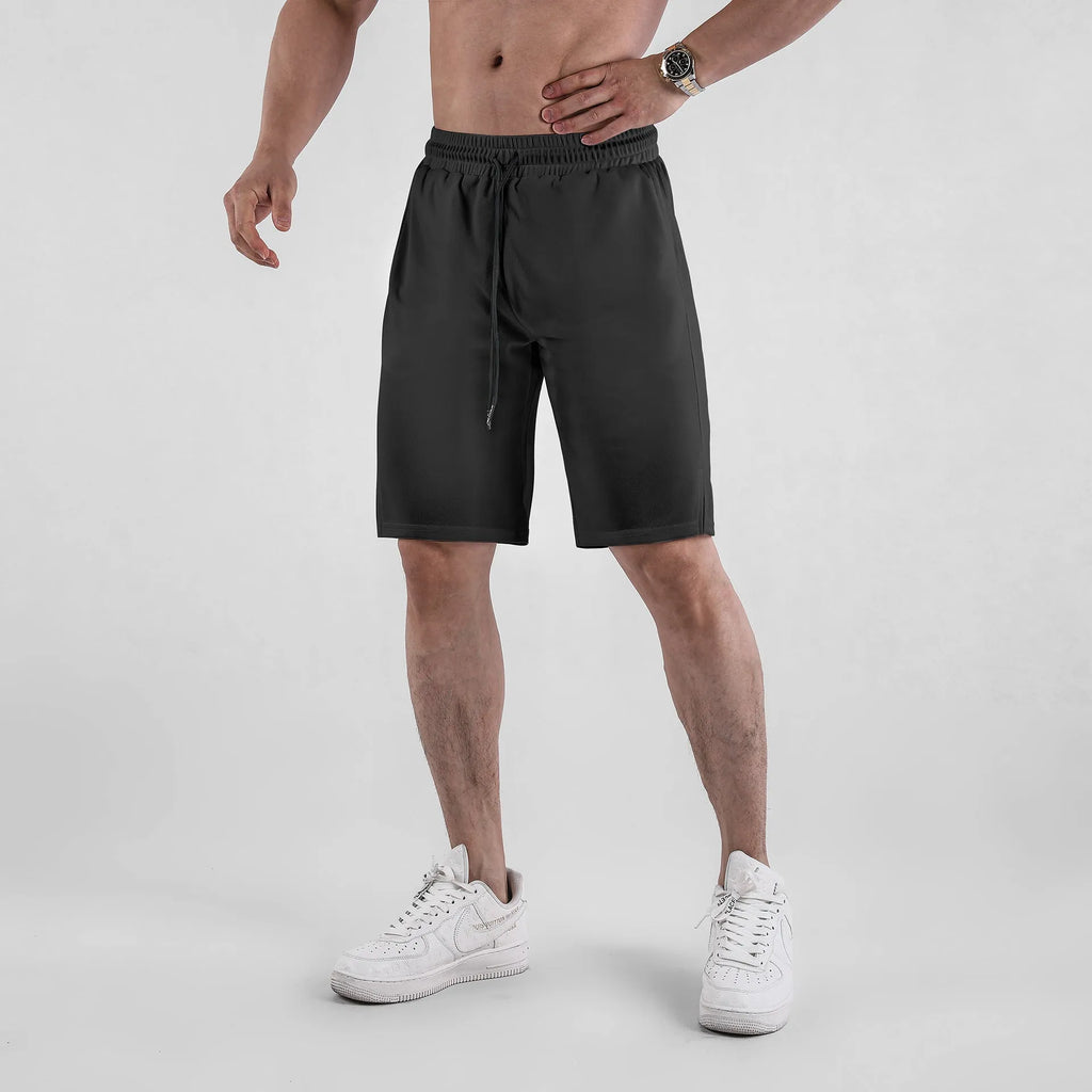 Men's black quick-drying mesh shorts with elastic waistband and loose fit for sports casual wear