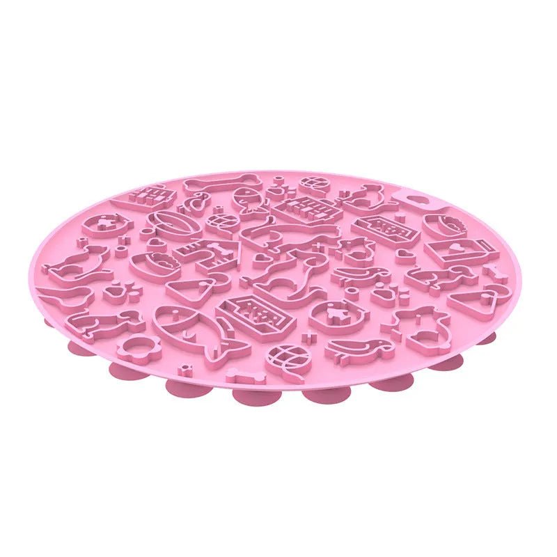 Round blue silicone pet licking mat with suction cups on a flat surface