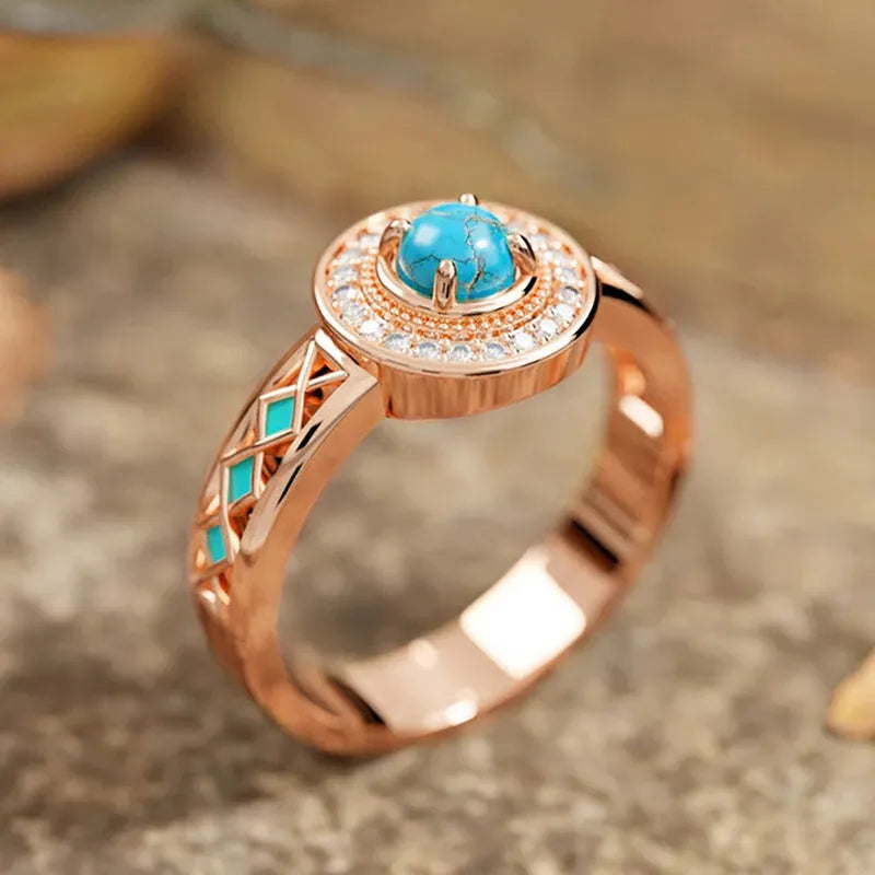 Women's ethnic geometric ring with turquoise accents and rose gold finish on copper