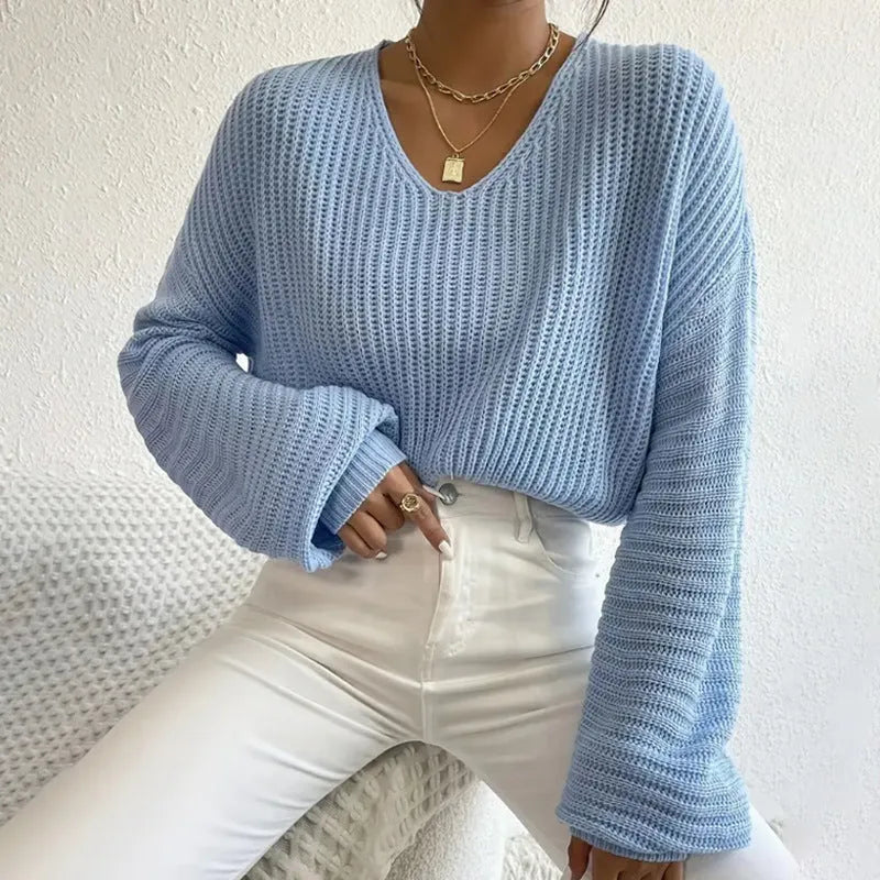 Solid colour women's polyester pullover top with long sleeves in black, pink, green, sky blue, or dark red