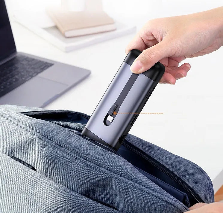 USB-C to multi-port hub adapter with HDMI, USB 3.0, PD charging, Ethernet, VGA, and card reader ports on a 9cm cable.