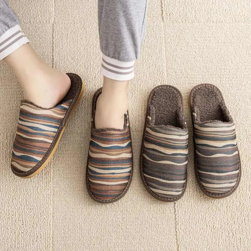 Warm winter linen surface cotton slippers with PVC sole, red flower colour, size 27cm on a wooden floor
