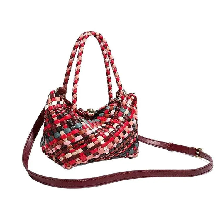 Women's casual handmade woven PU shoulder bag in colour, 18x11x14cm, on display