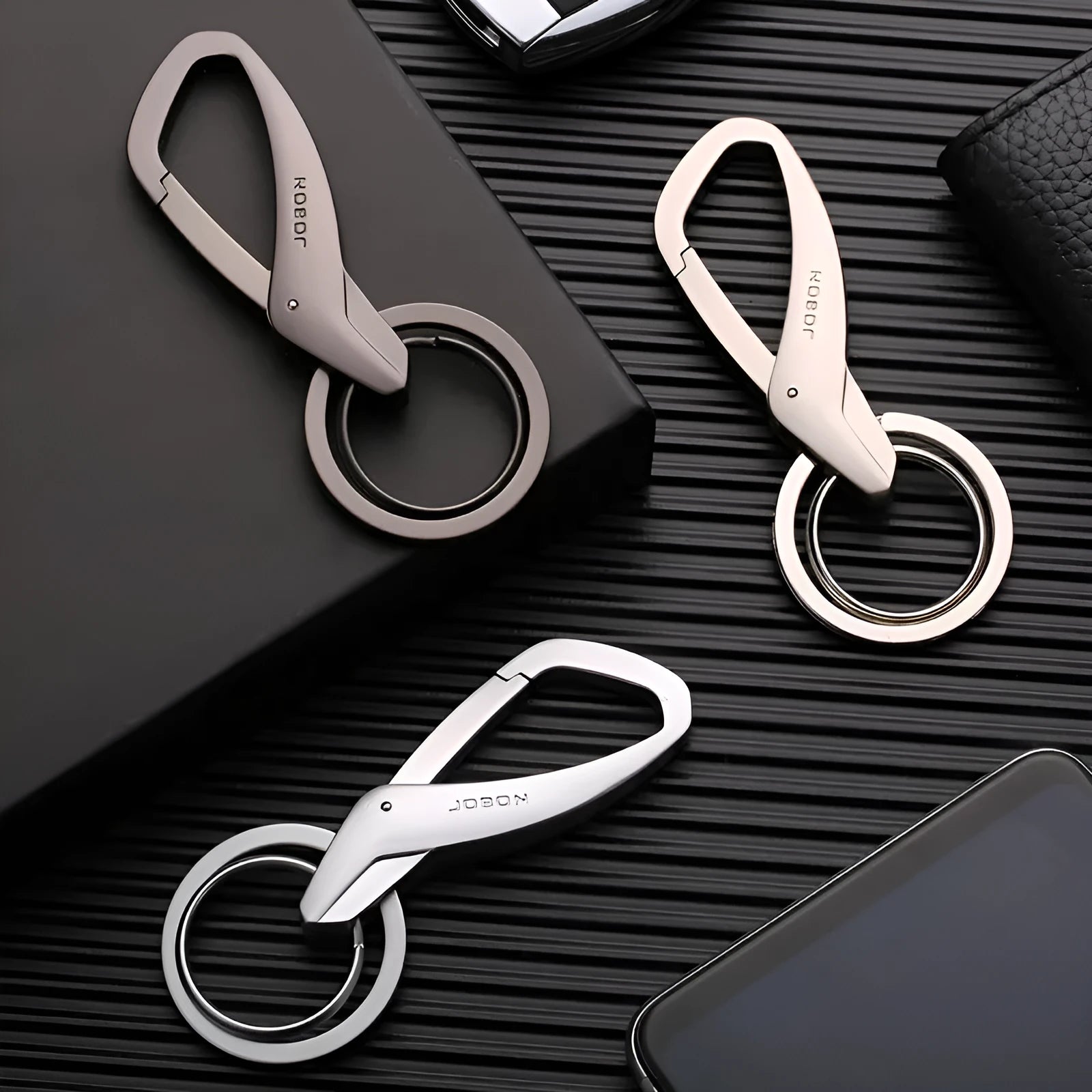 Zinc alloy double ring waist hanging keychain in black, chrome, or nickel finishes measuring 8.3x3.5cm