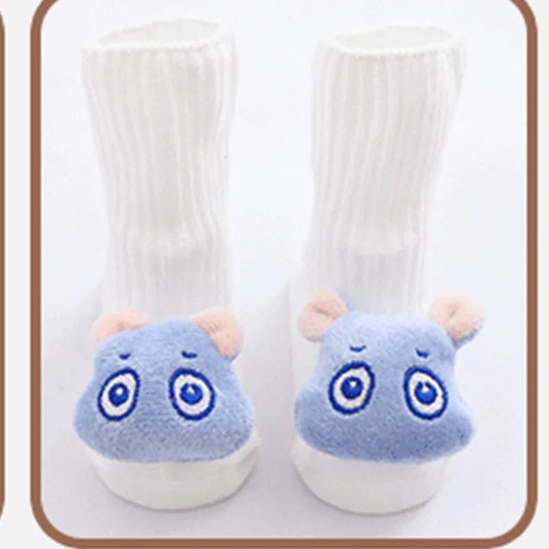 Cotton baby floor socks in multiple patterns including blue bow and lion designs