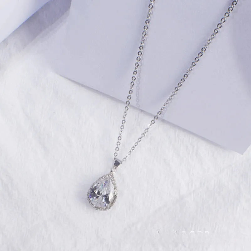 Drop-shape alloy necklace with rhinestone inlay available in eight electroplated colour finishes
