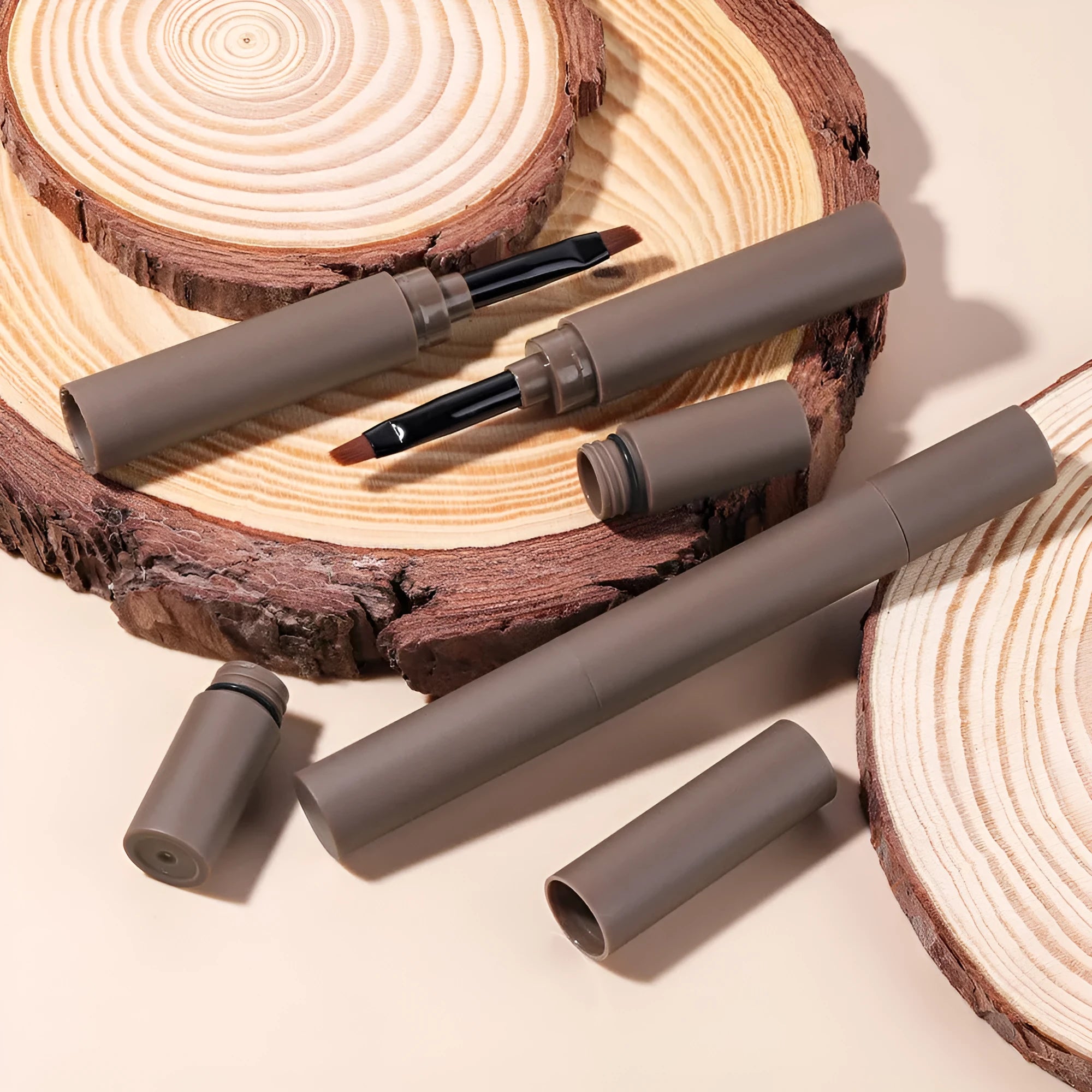 Double-headed eyebrow cream with pencil and powder applicators in five colour options