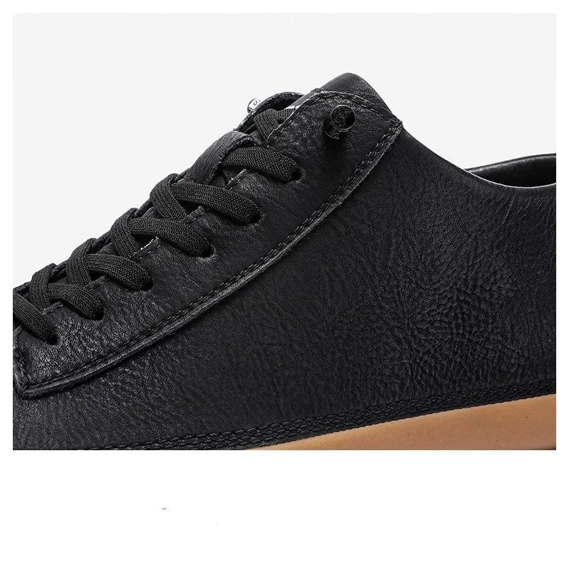 Men's black leather lace-up casual shoes with a round toe and rubber sole on a white background.