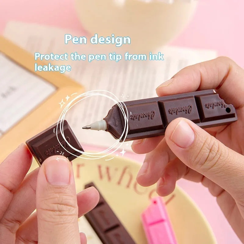 Cartoon chocolate bar ballpoint pen in pink, beige, or brown with 0.5mm bullet tip.