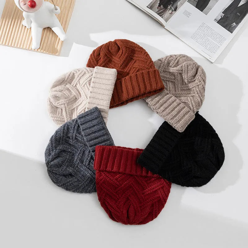 Women's wool knitted dome crown hat with totem pattern in seasonal colours