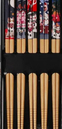 Five pairs of bamboo chopsticks with colourful Japanese lucky cat cartoon design.
