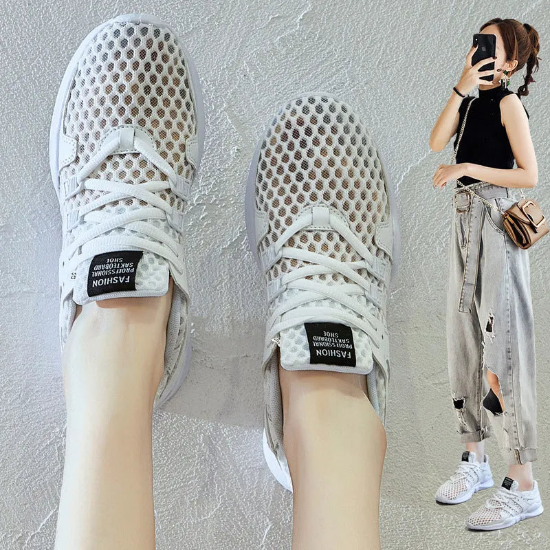 Low-top mesh sneaker with hollow breathable design and round toe in black and white colour options