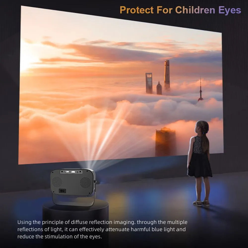Black HD portable projector with remote control on home office desk